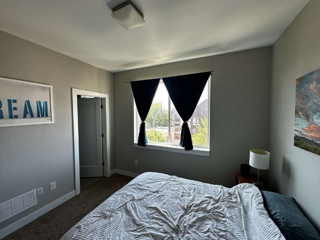 Building Photo - "Experience Modern Comfort: Spacious 2-Bed...