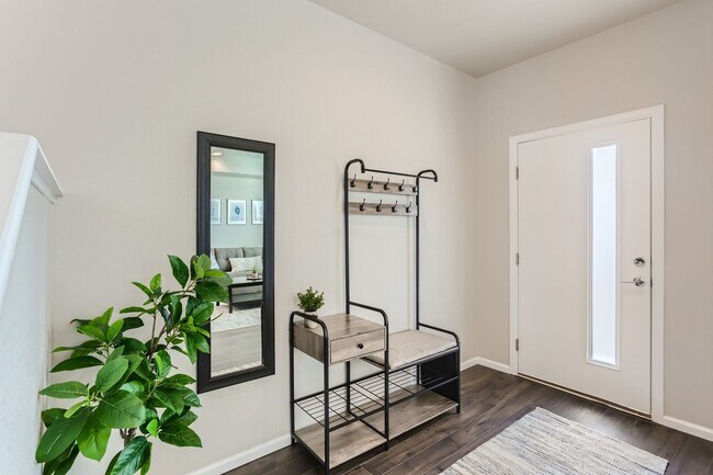Building Photo - Modern Comfort Minutes from DIA — 3BR Town...