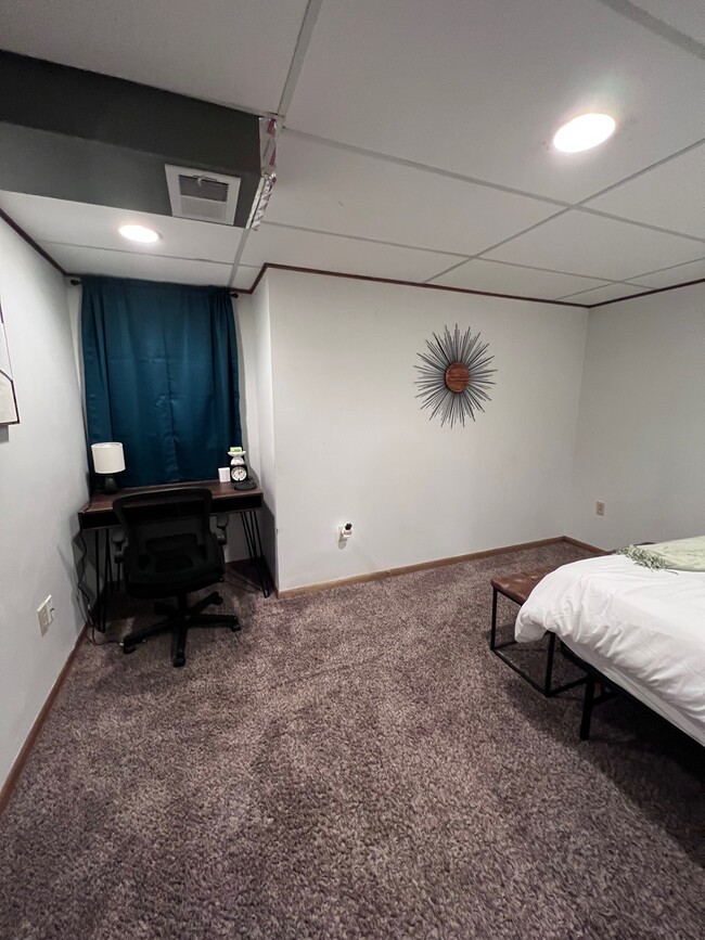 Basement bedroom 2 has a nook for a desk. - 1911 Talmage Ave SE