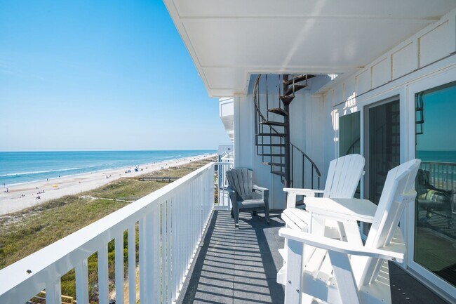 Building Photo - SPEND YOUR OFF-SEASON AT THIS TOP FLOOR OCEANFRONT CONDO