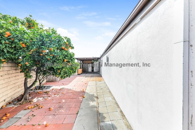 Building Photo - Spacious 4-Bedroom Tustin Home with Solar, Citrus Trees & Gas Fireplace