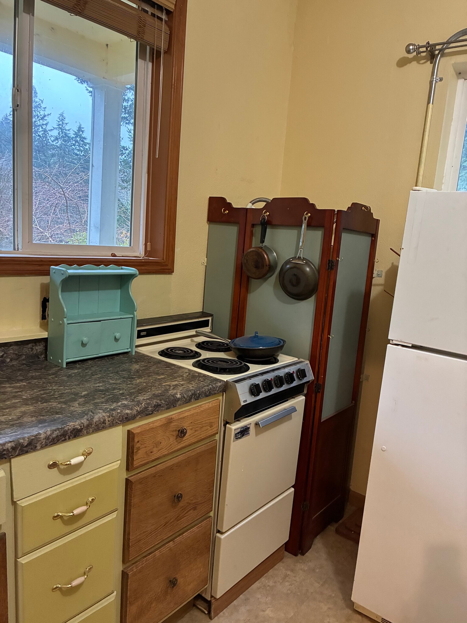 Kitchen, showing fridge - 4485 S Schooner Creek Rd