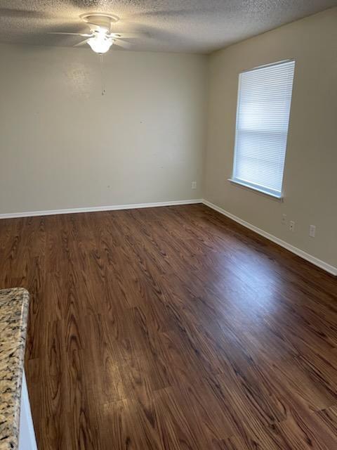 Building Photo - AVAILABLE NOW. GRANITE COUNTERTOPS. Spacious single-level Townhome with upgraded flooring throughout