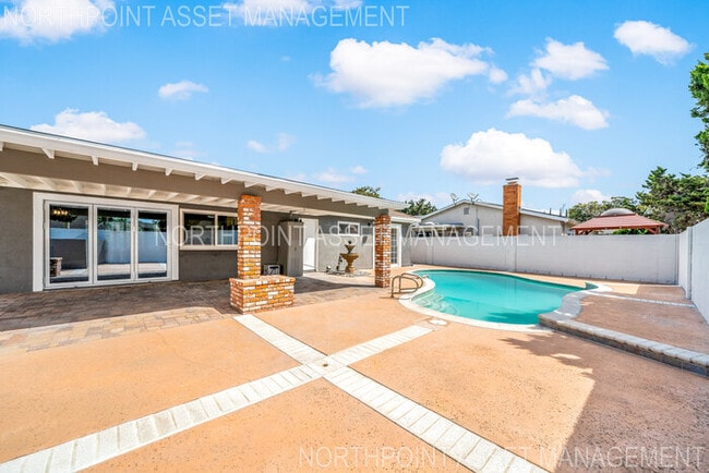Building Photo - Brand New Remodel – Stunning Pool Home wit...