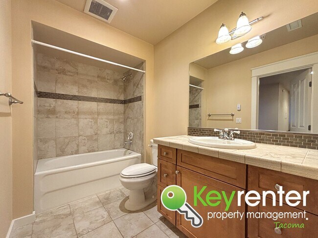 Building Photo - Luxury 2-Bed Condo in Tacoma, No Neighbors...