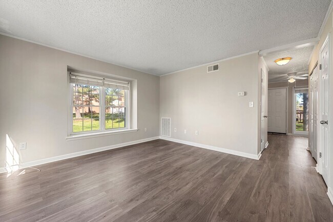 Building Photo - Introducing a Charming End Unit Townhouse ...