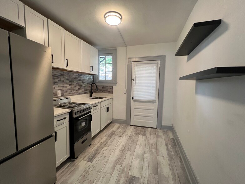2nd entrance to apartment into kitchen - 669 Avenue B NW
