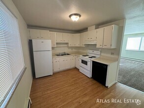 Building Photo - FREE December Rent - Newly Renovated Upper...