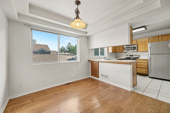 Building Photo - Beautiful 2BR Townhome in Gated Community with 2-Car Garage