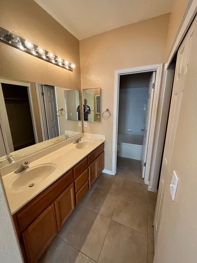 Building Photo - 3 Bed| 2 Bath | 1243 SF | 2 Car Garage | Single Story | Tenant pays $175 monthly for WS&G