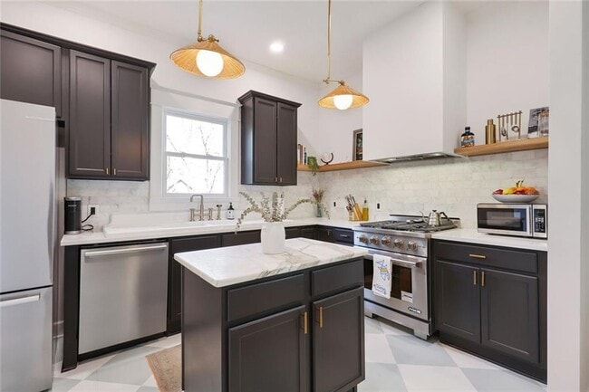 Building Photo - 1212 Merlin Ave SE