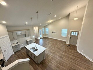 Angled high ceiling in liv room kitchen dining - 521 Peace Dr