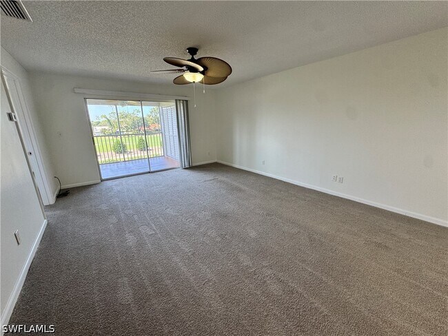 Building Photo - 12250 Tamiami Trl E