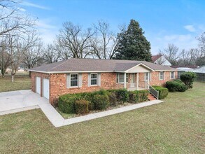 Building Photo - Charming 4-bedroom, 2-bath ranch-style home situated on just over 2 acres!