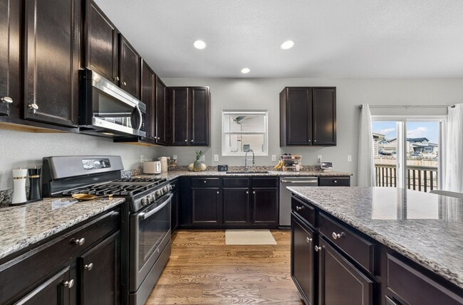 Building Photo - Upgraded 4-Bedroom Corner Lot Home with Mountain Views