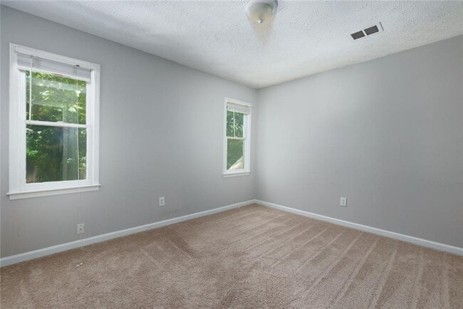 Building Photo - 1200 Mitsy Forest Dr NE