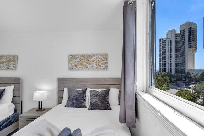 Building Photo - 19370 Collins Ave