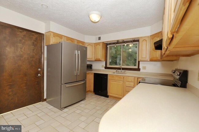 Building Photo - 11800 Wolf Run Ln