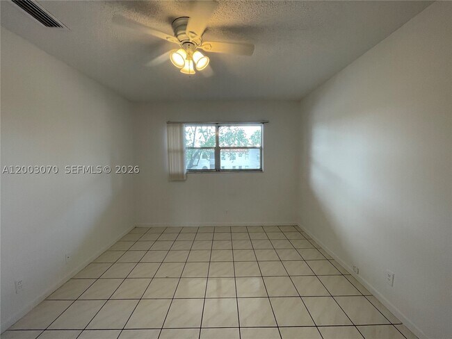 Building Photo - 7410 Woodmont Terrace