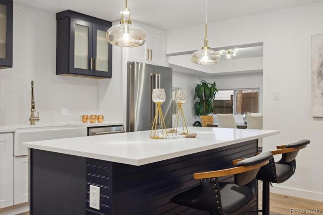 Building Photo - 6050 E Alameda Ave