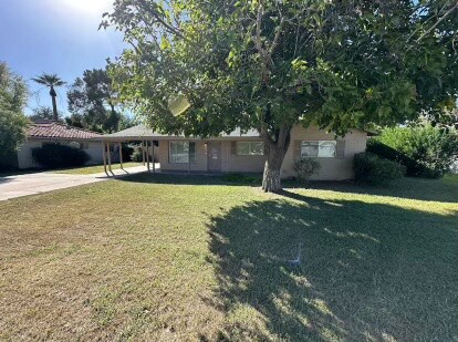 Building Photo - 6557 N 10th Ave