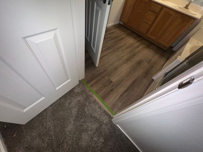 Building Photo - Fresh Paint/New Flooring all inside! Four ...