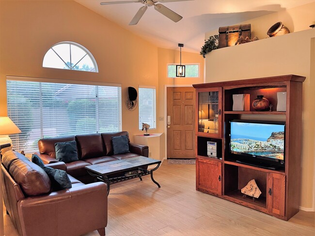 Great Room with view of large Flagstone Patio - 9257 E Sutton Dr