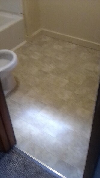 New bathroom flooring - 663 court st