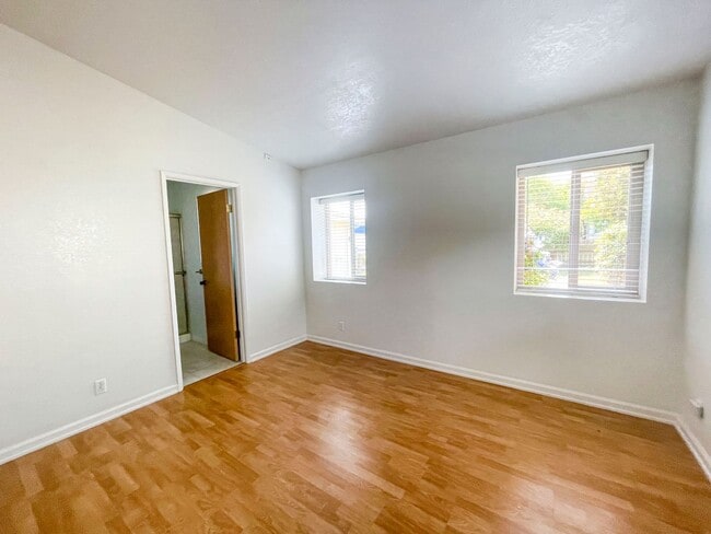 Building Photo - This gorgeous Pine Hills home has a large interior, 2-car garage, and fully-fenced yard!