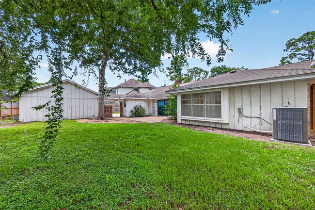Building Photo - 12411 Pinerock Ln