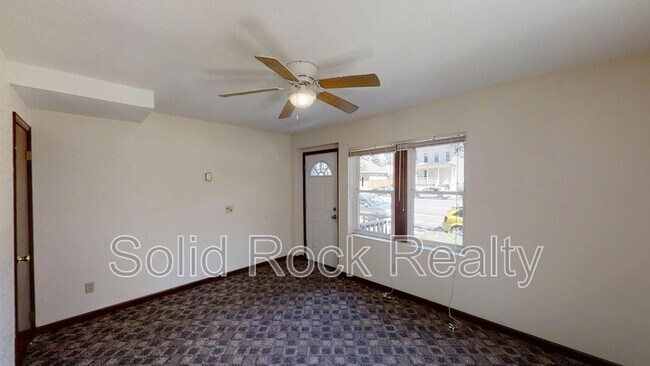 Building Photo - 511 E Cache La Poudre St