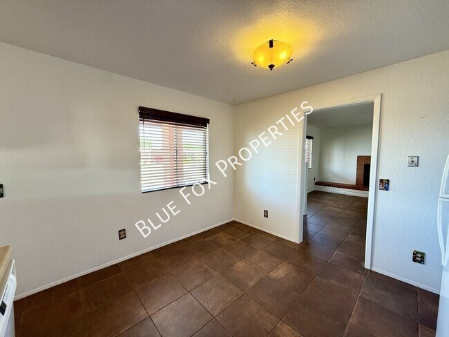 Building Photo - 7650 N Rasmussen Ave