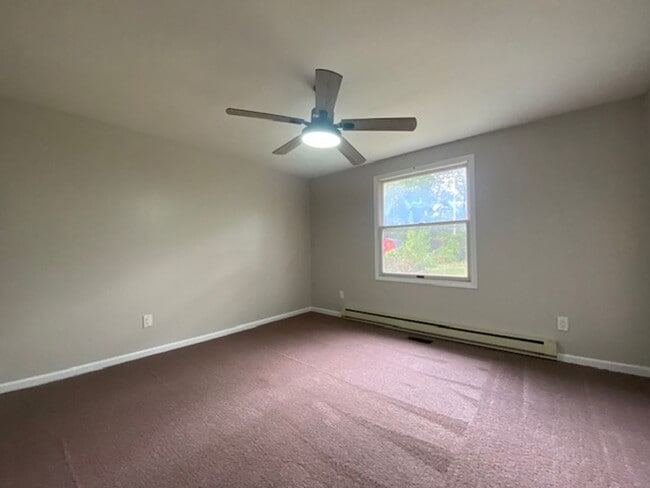 Building Photo - Welcome to this charming three bedroom, on...