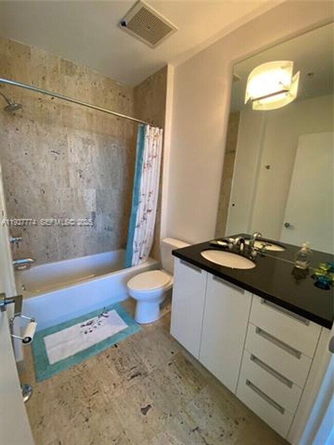 Building Photo - 7901 Hispanola Ave