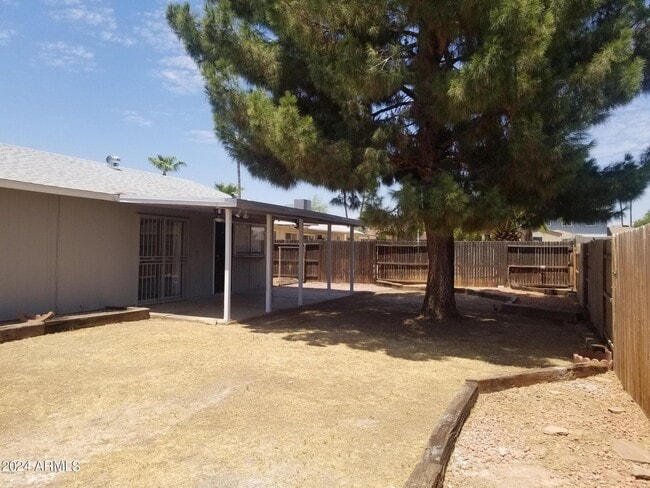 Building Photo - 10047 N 48th Ave
