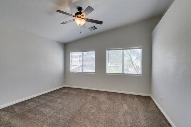 Building Photo - Great townhome in Henderson Gated Community with a 2 car attached garage and backyard