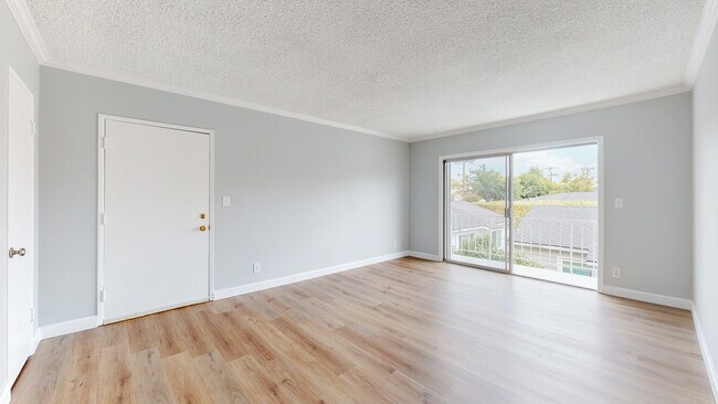 3733 Military Living Rm Balcony - 3733 Military Ave