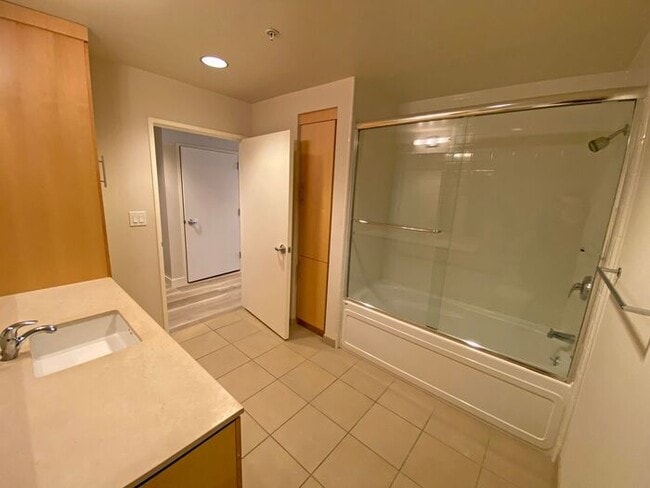 Building Photo - Live at The Axis High-Rise! Upscale, Urban...