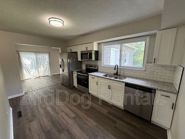 Building Photo - 4845 Downing Dr