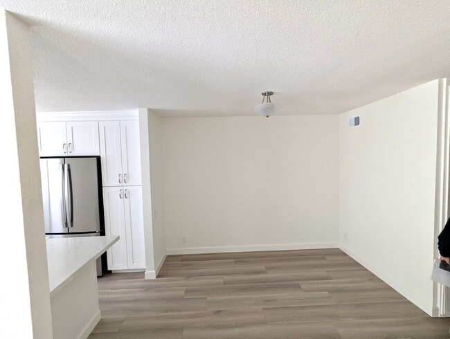 Building Photo - Total remodel - New kitchen, new bathroom, new appliances, new electrical, new paint, new floors