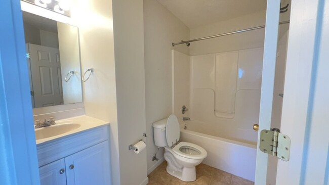 Building Photo - Spacious 3-Bedroom End Unit in Liberty Squ...