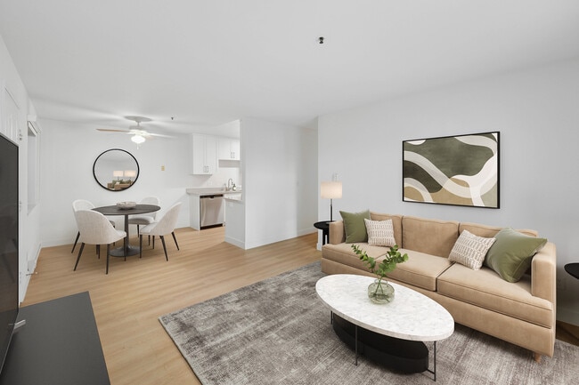 Renovated Package I living and dining area with hard surface flooring - Avalon Mountain View