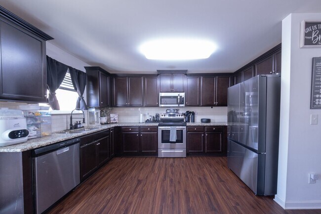 Building Photo - 4 Bedrooms | 2.5 Bathrooms | 2,032 Sq. Ft