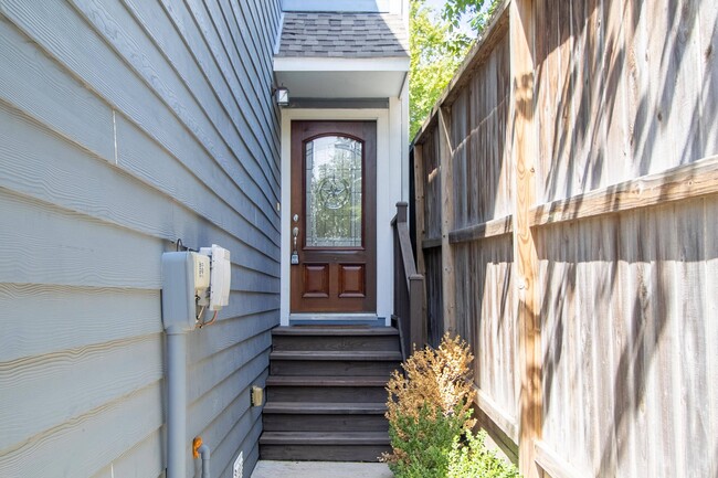 Covered front entrance door / package drop off area - 1221 W 23rd St