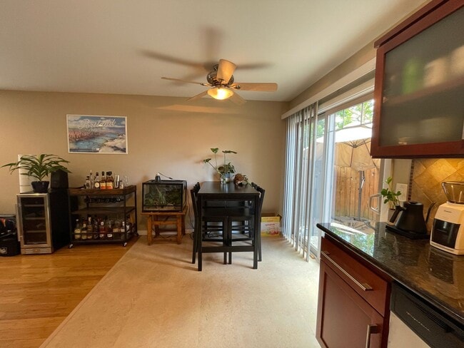 Building Photo - Stylish Corner Condo In Prime Location w/ Parking, Private Outdoor Space & W/D