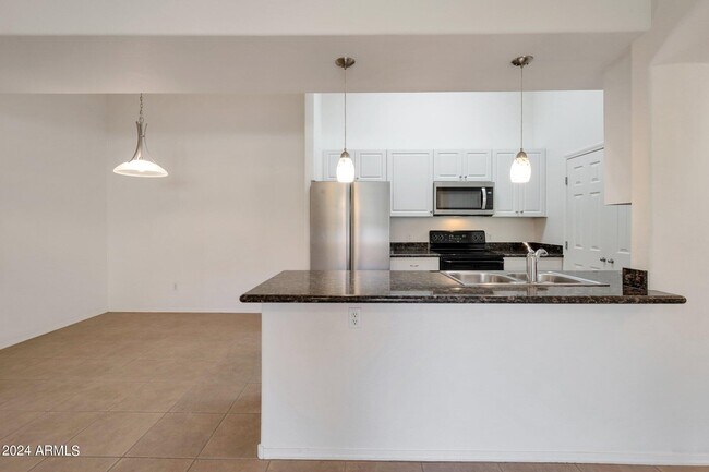 Building Photo - 10136 E Southern Ave