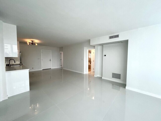 Building Photo - Fully Renovated East-Facing 2BR/2BA + Bonus Room | Ocean Views | In-Unit W/D