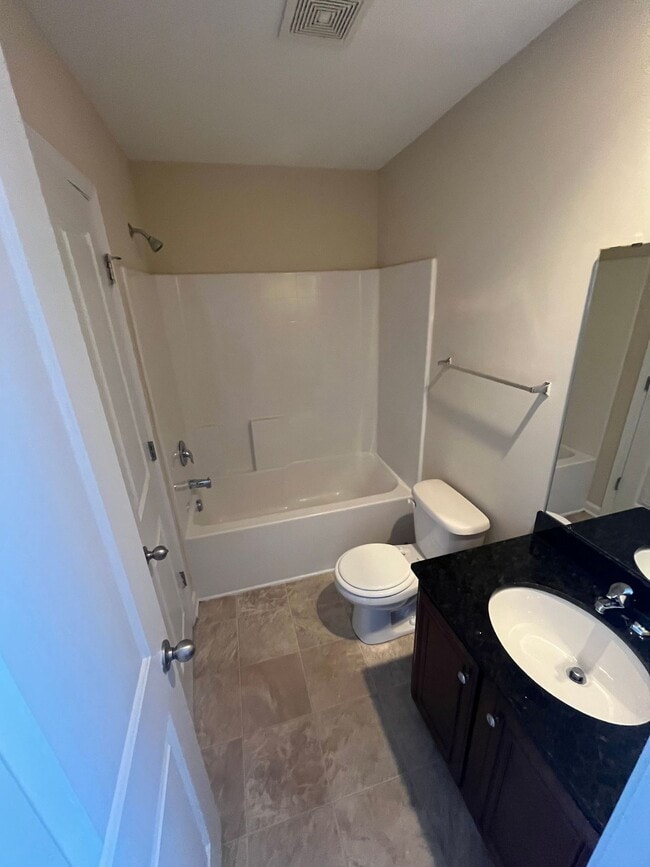 Building Photo - 4-bedroom, 2.5 bathroom townhome