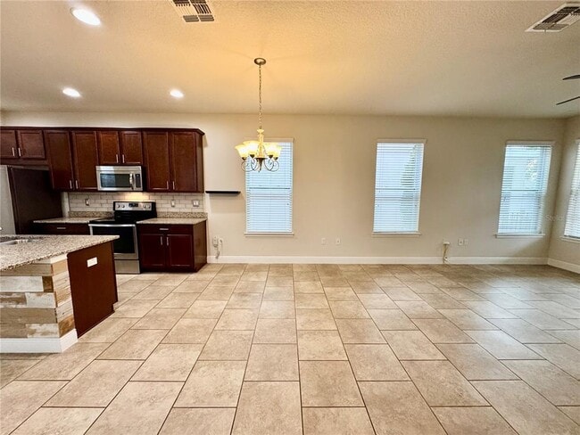 Building Photo - 7208 Milestone Dr