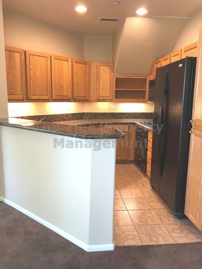 Building Photo - **Gated 3 bed, 3 bath Townhome with 2-Car ...